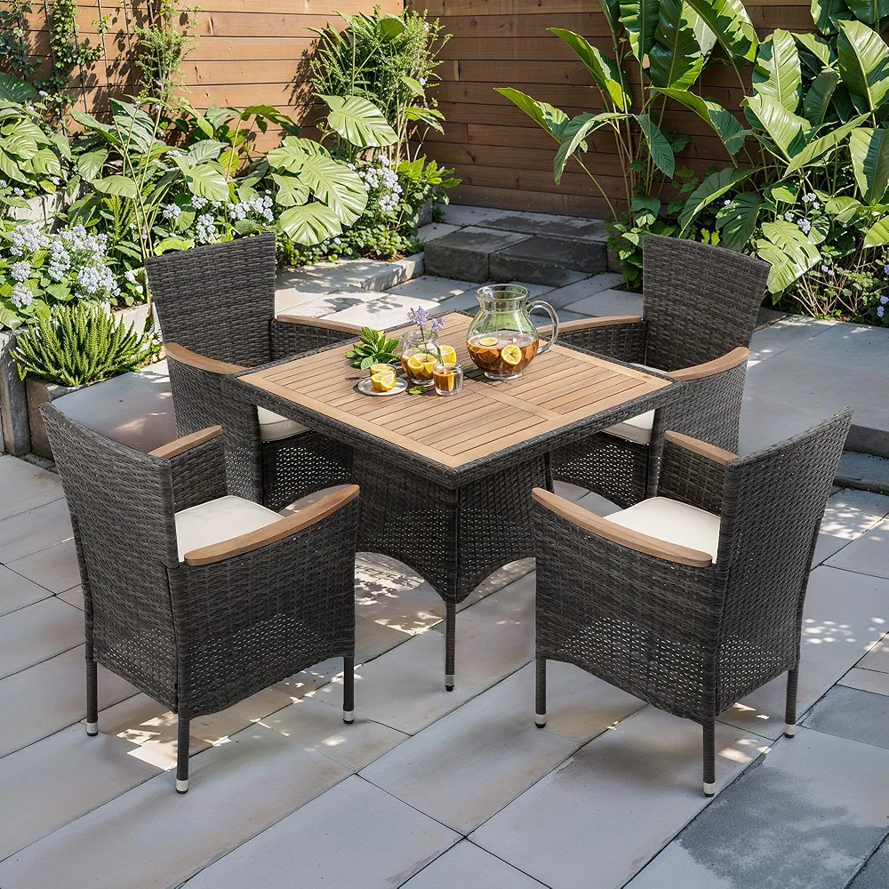 FansaFurn grey rattan dining table set featuring a square acacia wood tabletop, country rustic style, weather-resistant PE rattan weave, cushioned wide chairs, and sturdy steel frame for durable outdoor dining.